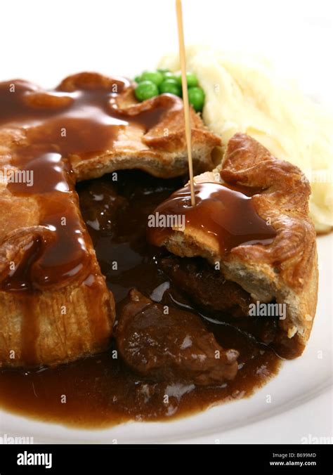 Steak pie with gravy Stock Photo - Alamy