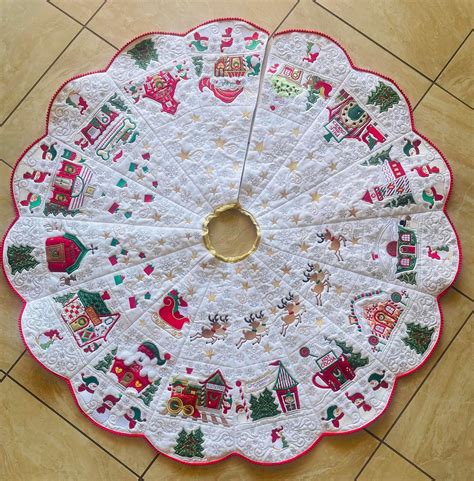 a white doily with christmas decorations on it