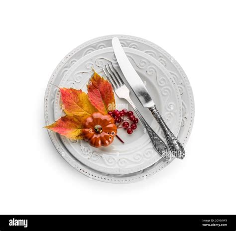 Thanksgiving table setting on white background Stock Photo - Alamy