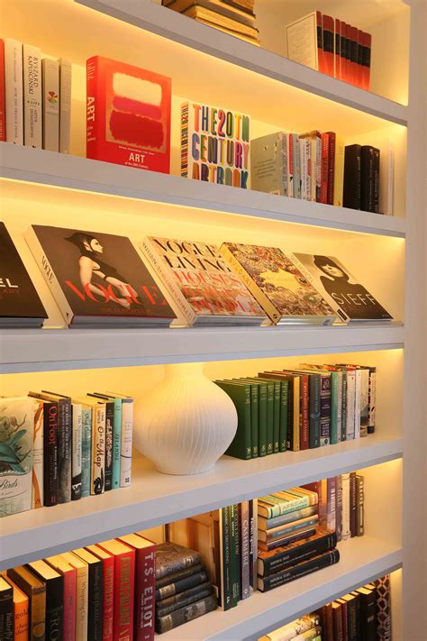 Bookshelf Lighting Design by John Cullen Lighting. For more ...