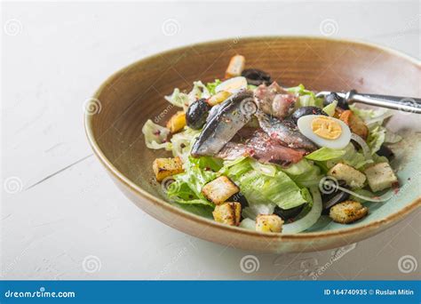 Salad with Anchovies, Olives and Crackers Stock Image - Image of snack ...