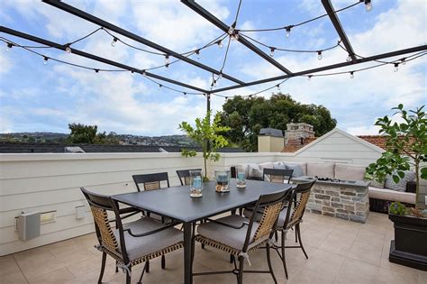 Modern Rooftop Terrace with String Lights