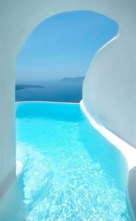 Luxurious santorini hotel has rooms with secret tunnels to hidden ...