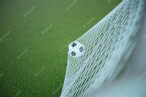 Premium Photo | 3d rendering soccer ball in goal. soccer ball in net ...