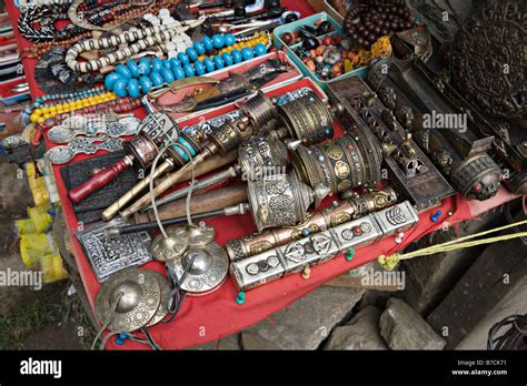 Sherpa souvenirs for sale on a stall in Namche Bazaar village in ...