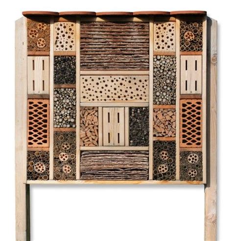 a piece of art made out of wood with different patterns and shapes on ...