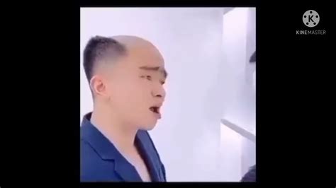 Chinese bald man singing - YouTube