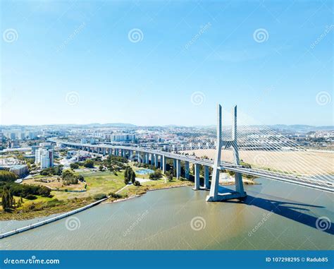 Aerial View of Vasco Da Gama Bridge and High Car Traffic in Lisbon City ...