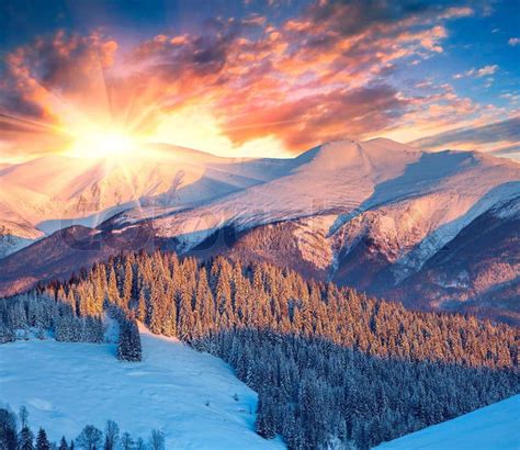 Colorful winter sunrise in mountains. | Stock Photo | Colourbox