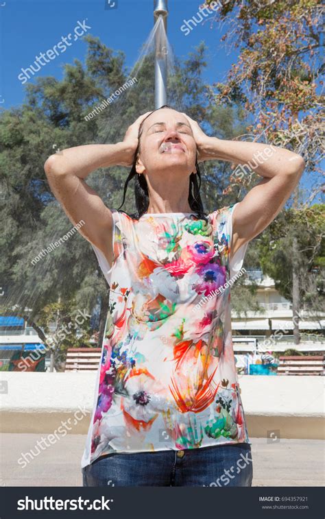 Fully Clothed Woman Taking Cool Shower Stock Photo 694357921 | Shutterstock