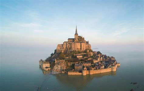 Mont-Saint-Michel, a Medieval Abbey in France, during high tide. : r ...