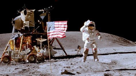 Astronaut On Moon By The American Flag