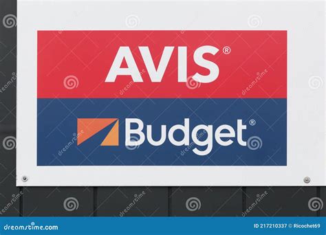 Avis Budget logo on a wall editorial photography. Image of symbol ...