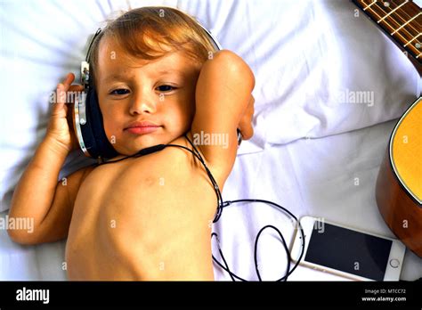 Baby headphones sleeping hi-res stock photography and images - Alamy