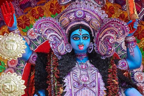 An image of the Hindu deity Kali during the Kali Puja festival in ...