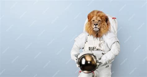 Premium Photo | Successful astronaut lion in a space suit with a helmet ...