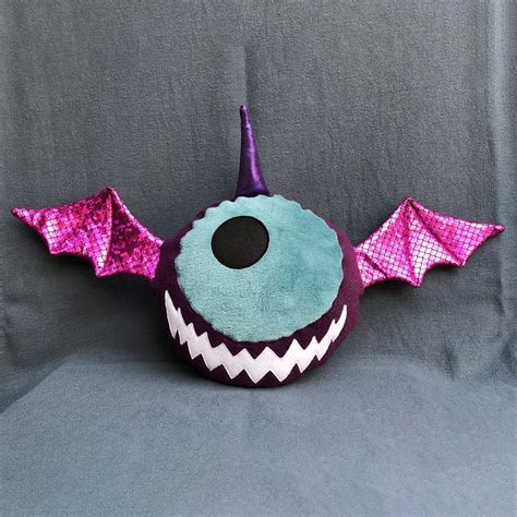 Arielle, the purple people eater plush monster