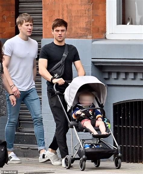 Tom Daley, 25, and his husband Dustin Lance Black, 44, enjoy walk with ...