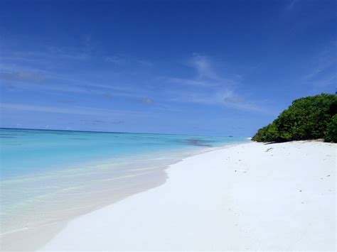 Beaches of Fulhadhoo Maldives surrounded by crystal-clear water. # ...