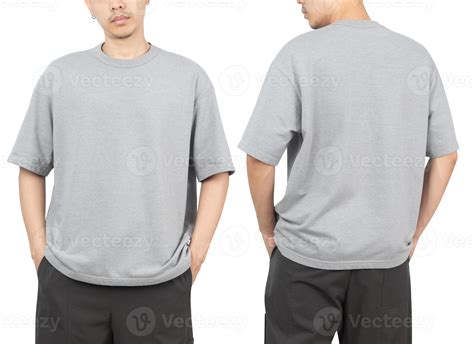 Young man in grey oversize t-shirt mockup front and back used as design ...