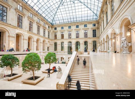 People inside the The Louvre Museum in Paris France Stock Photo - Alamy