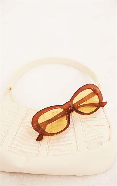 Yellow Lens Flared Rounded Sunglasses | PrettyLittleThing SA