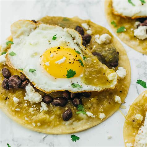 Huevos rancheros with salsa verde and black beans - savory tooth