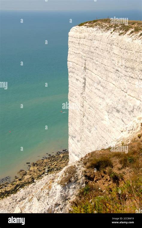 Sheer, high vertical cliff at Beachy Head, East Sussex, England with ...