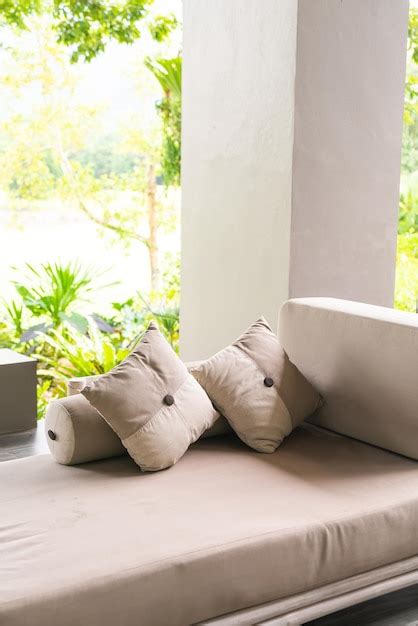 Premium Photo | Comfortable pillows on sofa for relax