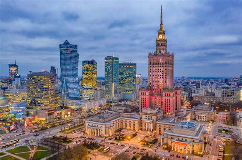 Wall mural Illuminated Warsaw Center in the Evening, Palace of Culture ...