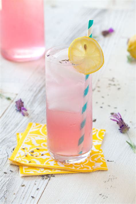 Lavender Lemonade - TownandCountrymag.com | Lavender lemonade, Mocktail ...