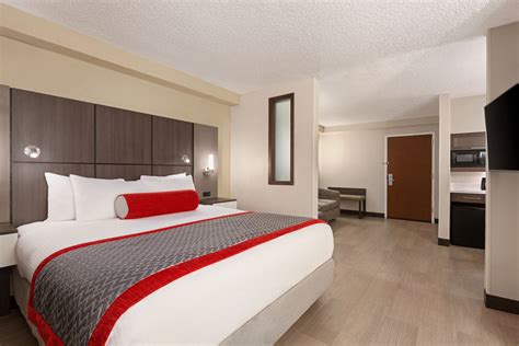 Ramada by Wyndham Suites Orlando Airport | Orlando, FL Hotels