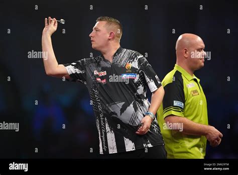 Chris Dobey celebrates victory over Michael van Gerwen during day ...