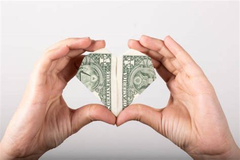 Fold Money Into Heart Stock Photos, Pictures & Royalty-Free Images - iStock