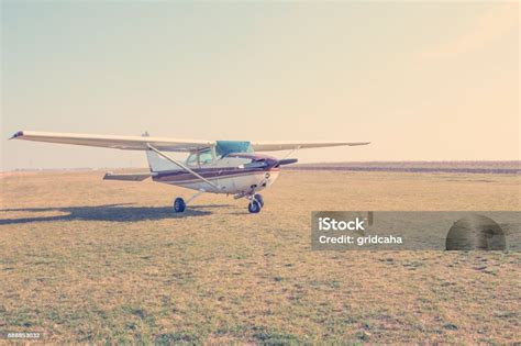 Small Airplane Landing Stock Photo - Download Image Now - Aerospace ...