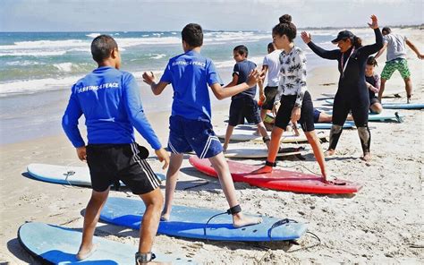 Arab Israeli surfing instructor nets visitors for her fishing village ...