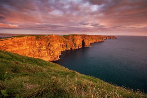 Majestic Cliffs Of Moher At Sunset Photograph by Pierre Leclerc ...