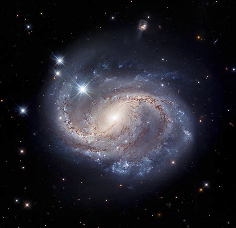 Hubble Captures Majestic Barred Spiral