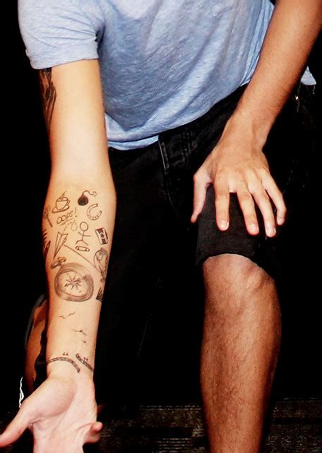 Louis Tomlinson's Half Sleeve Arm Tattoos- PopStarTats