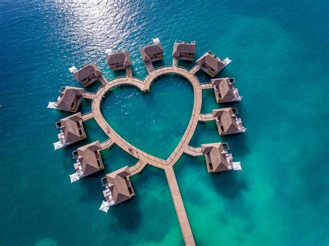 Sandals Resorts’ Over-The-Water Bungalows Are The Ultimate Luxury