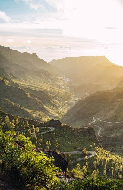 Premium Photo | Sunset landscape of mountains full of green color and ...