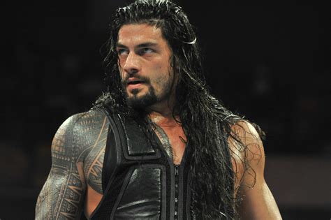 WWE superstar Roman Reigns reflects on signing day, path from football ...