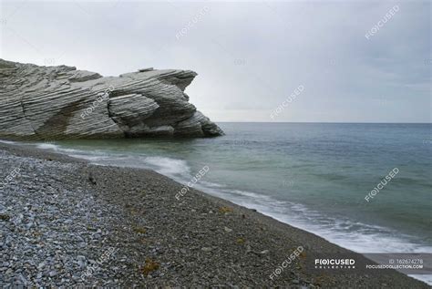 Beach With Rock Formation — water, seascape - Stock Photo | #162674278