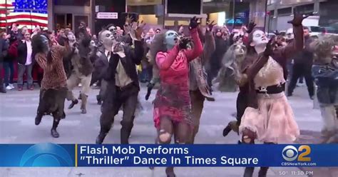 Flash mob performs "Thriller" dance in Times Square - CBS New York