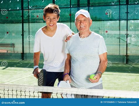 Padel Players of Different Generations Posing on Padel Court Stock ...