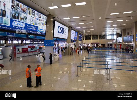 Inside / interior passenger check-in desks / check in area desk in ...