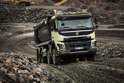 yellow and black Volvo dump truck #road #stones #dust #Volvo #truck # ...