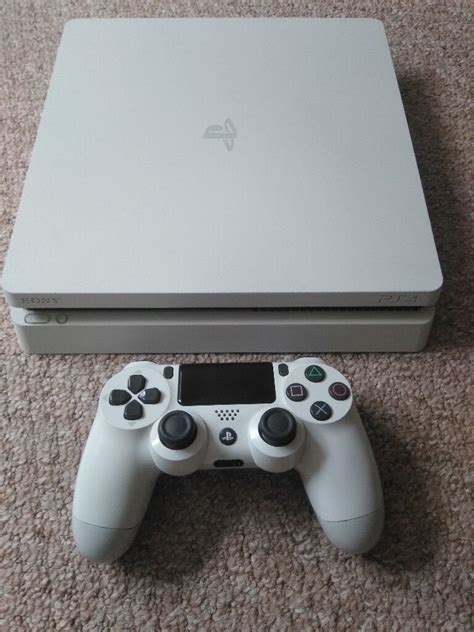 White Playstation 4 / PS4 -- Slim, 500gb.....price is not negotiable ...