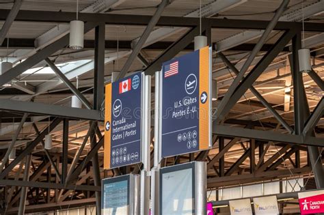 Canada and US Gates Signs on Departures Level at the Ottawa ...