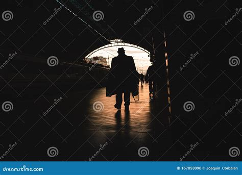 Silhouette of Passengers in a Train Station Stock Photo - Image of ...